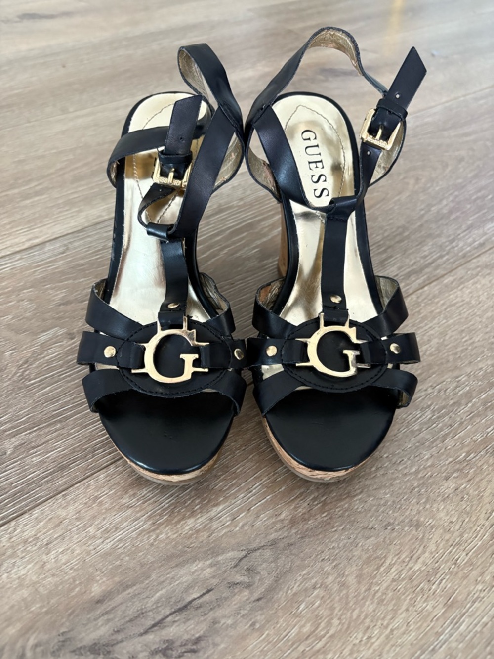 GUESS Black Leather Strappy Wedge Sandals with Gold G Emblem